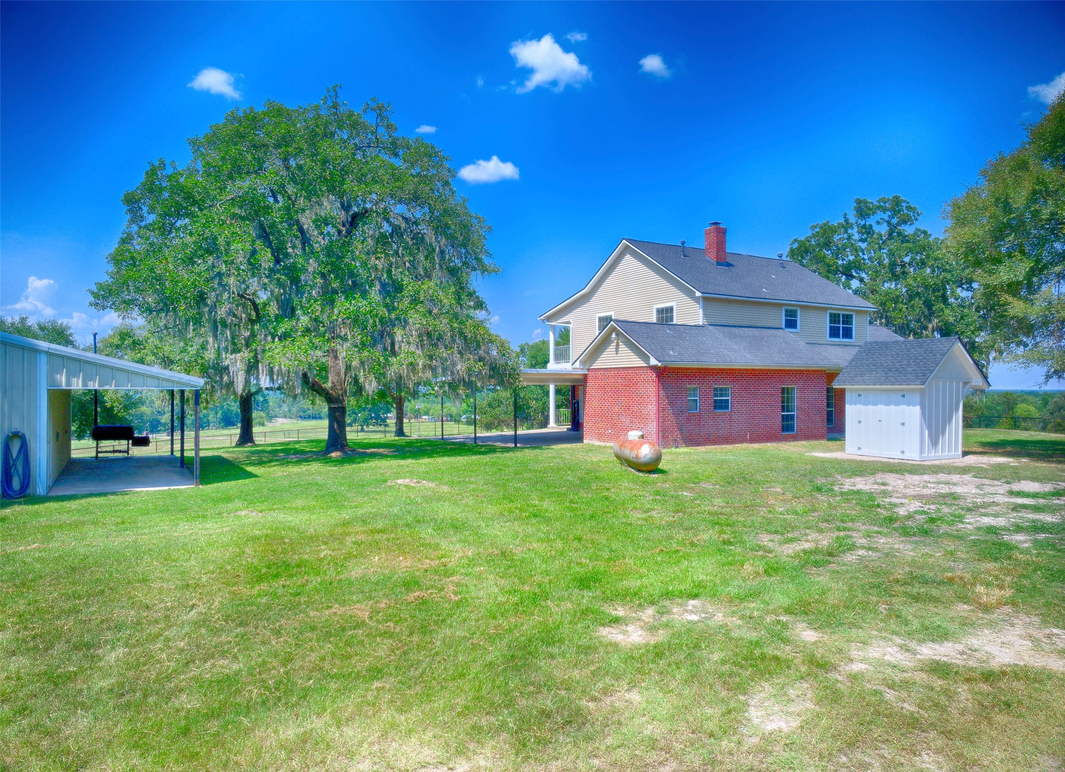 2 Highland Drive Huntsville, TX 77320 - Photo 42 of 50 a view of a house with a yard