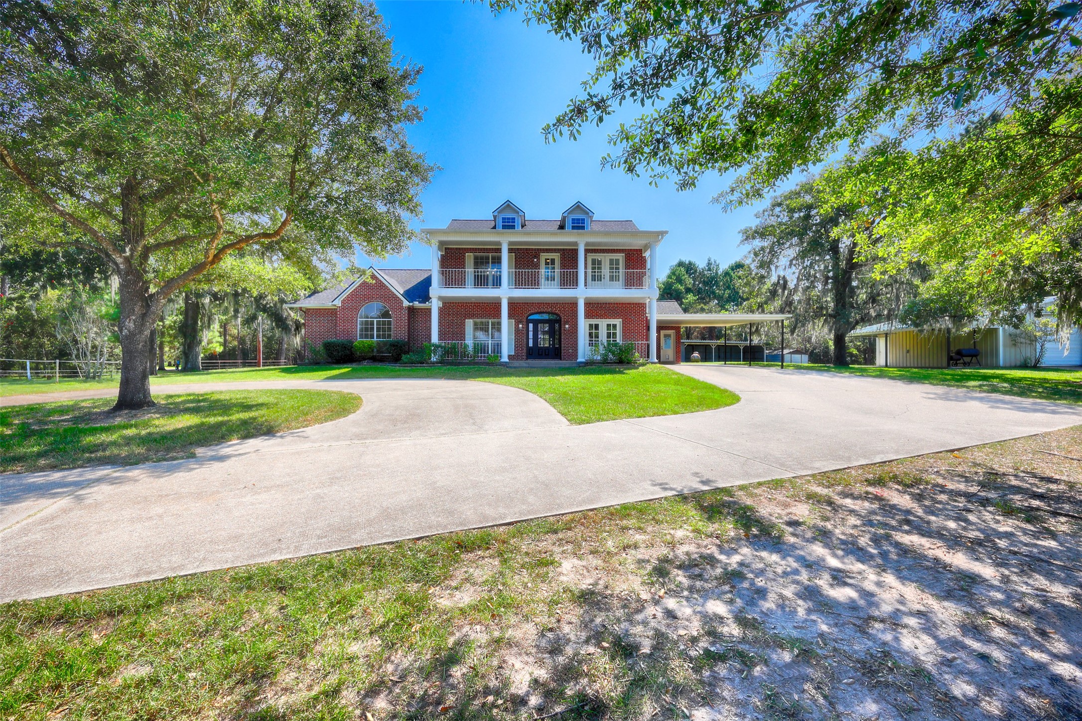 2 Highland Drive Huntsville, TX 77320 - Photo 50 of 50 a view of a house with a big yard and large trees