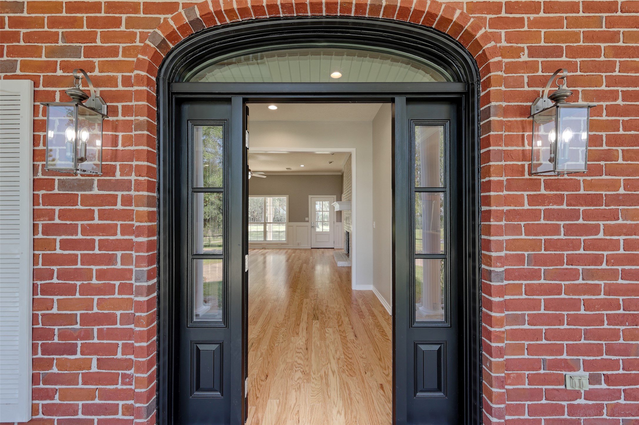 2 Highland Drive Huntsville, TX 77320 - Photo 10 of 50 a front view of a house with a glass door