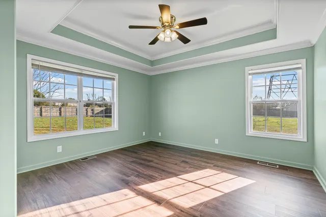 a view of an empty room and window