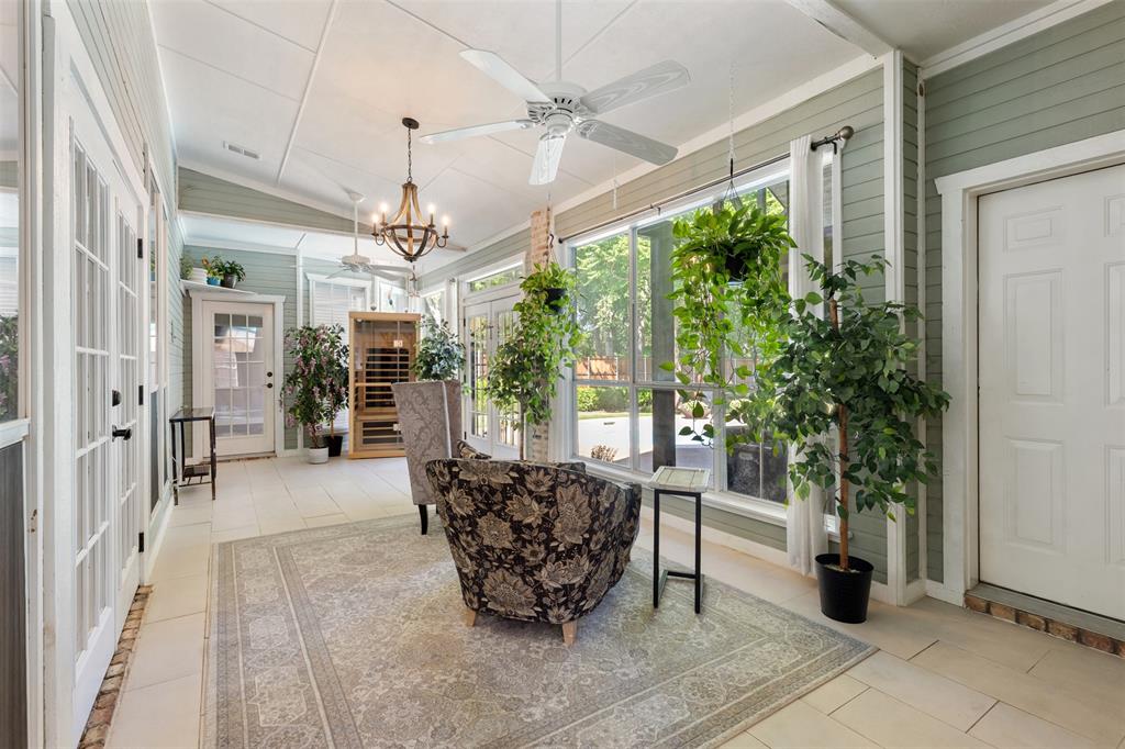 609 Seville Road Denton, TX 76205 - Photo 16 of 40 Enclosed Sunroom with doors to primary bed, living, garage & backyard.