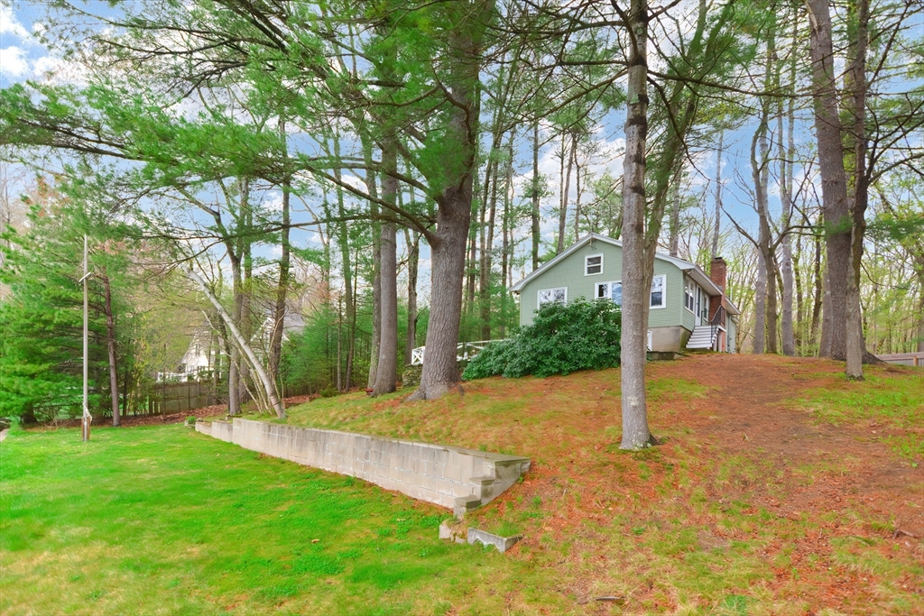 30 Sunset Lane Lunenburg, MA 01462 - Photo 25 of 29 a view of a tree in front of a house with large tree