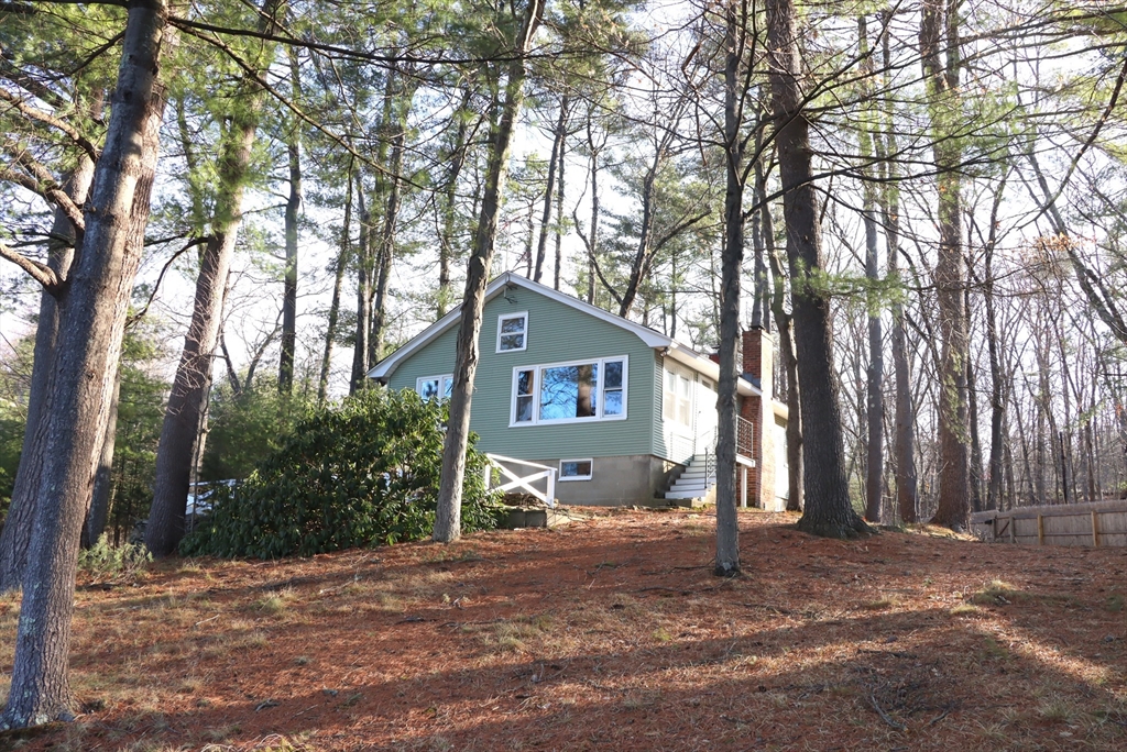 30 Sunset Lane Lunenburg, MA 01462 - Photo 28 of 29 a house with trees in front of it