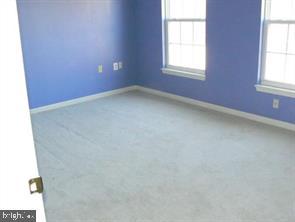 538 Rhapsody Court, Unit 538 Cockeysville, MD 21030 - Photo 22 of 30 Bright and airy blue room awaits you.