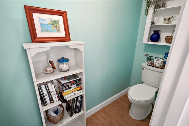 a bathroom with a toilet and a sink