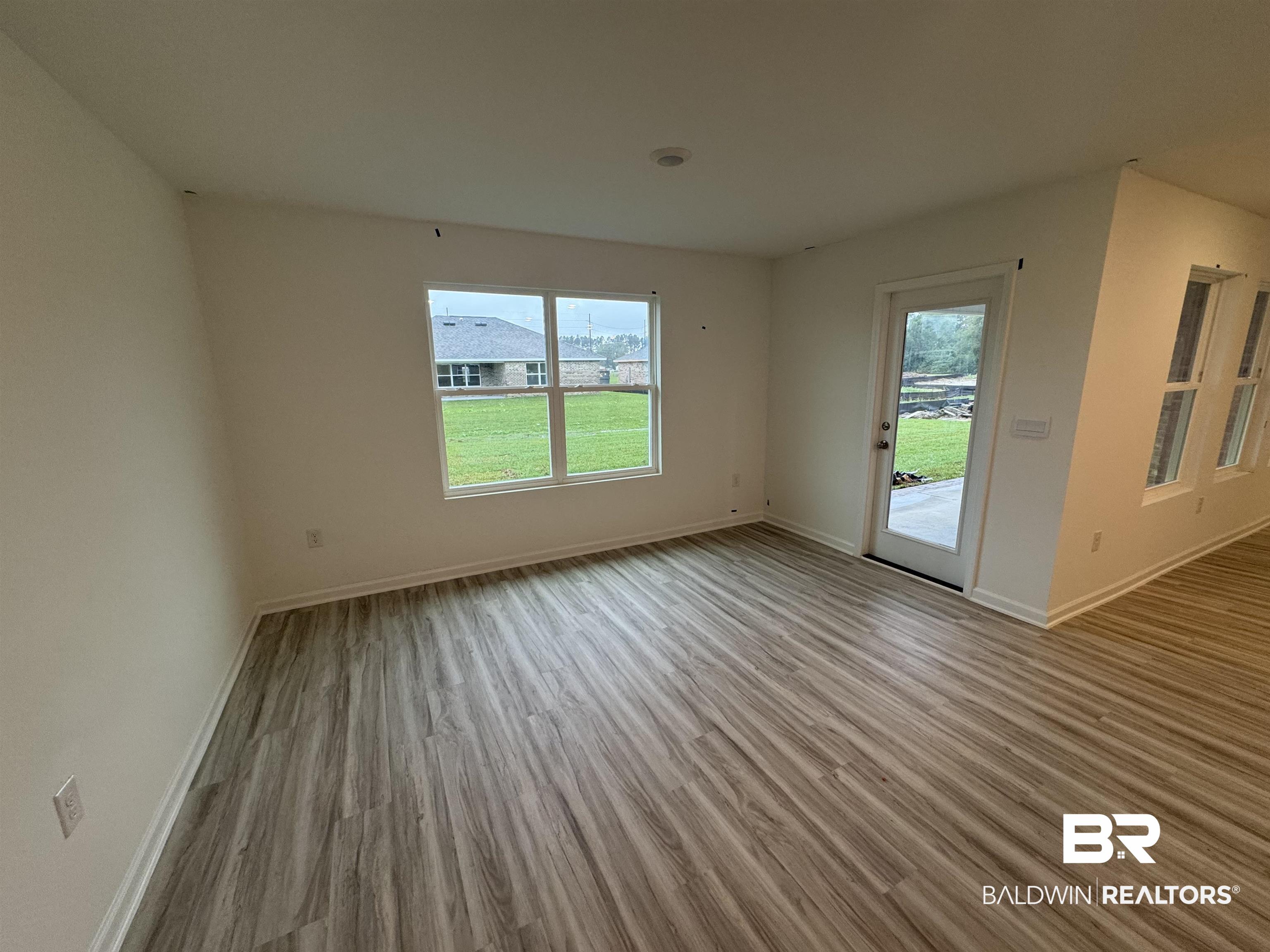 24431 Ringneck Loop Elberta, AL 36530 - Photo 11 of 15 Unfurnished room featuring light hardwood / wood-style flooring