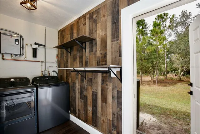 a view of a livingroom with wooden floor