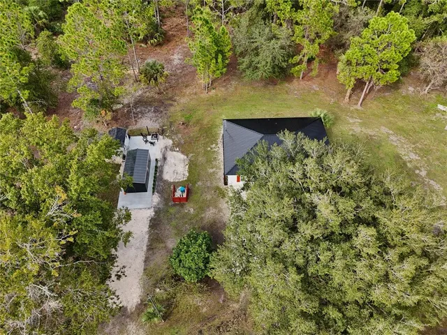 a view of a garden with a bench