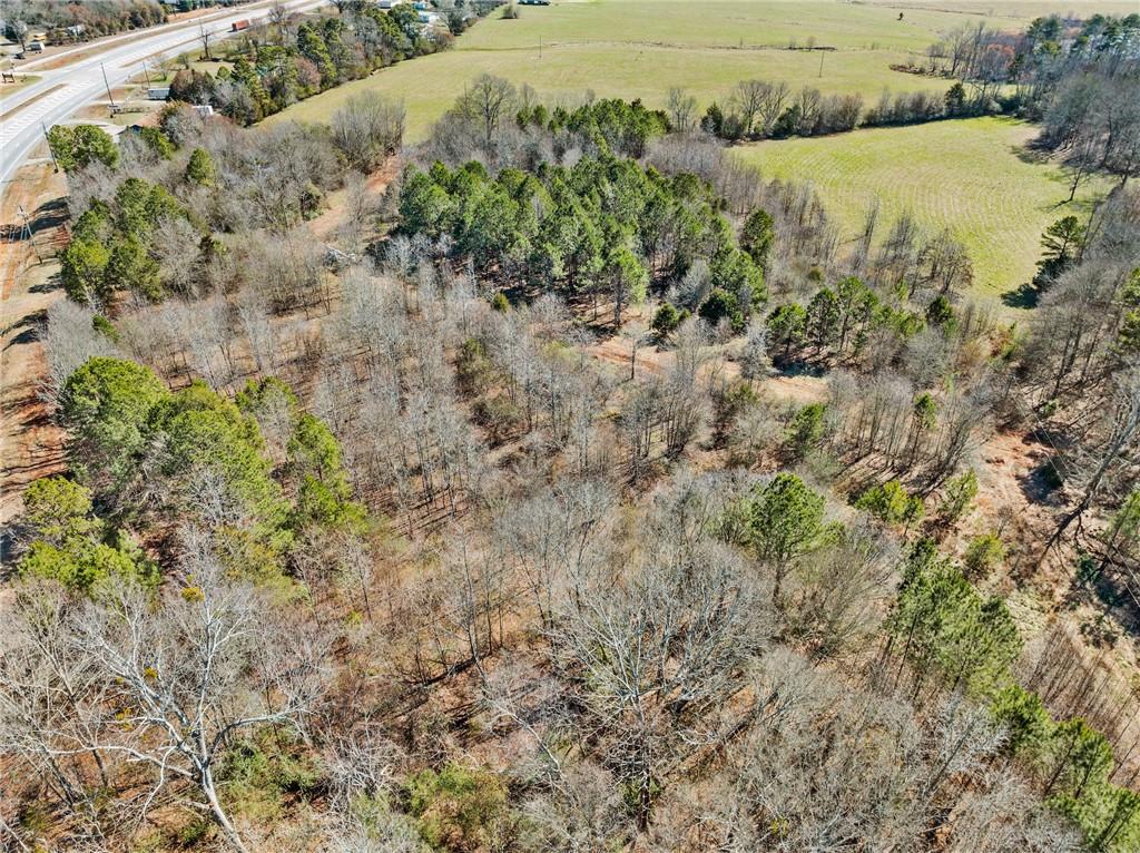 4 West 4w Farm Road Jefferson, GA 30549 - Photo 11 of 16 a view of a lake with a yard