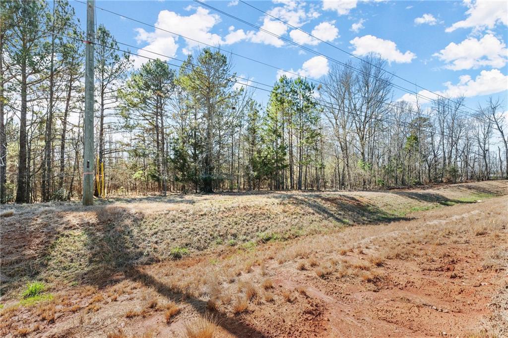 4 West 4w Farm Road Jefferson, GA 30549 - Photo 7 of 16 a view of a backyard of a house