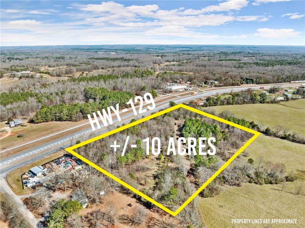 4 West 4w Farm Road Jefferson, GA 30549 - Photo 10 of 16 a view of a swimming pool with a terrace
