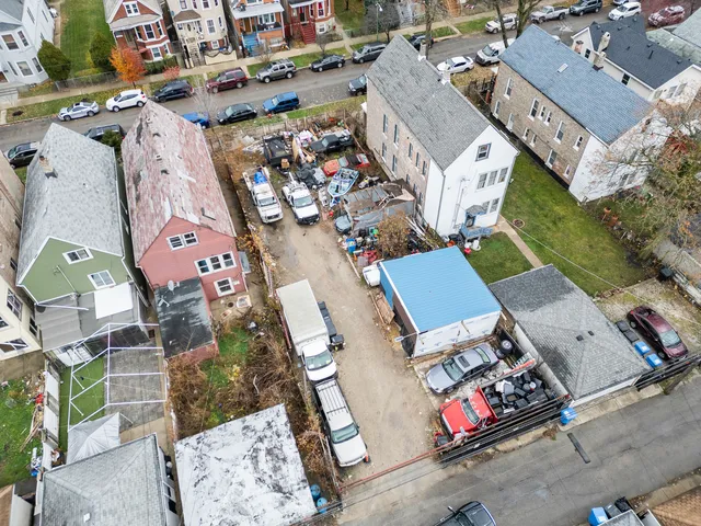 an aerial view of a city with lots of residential buildings