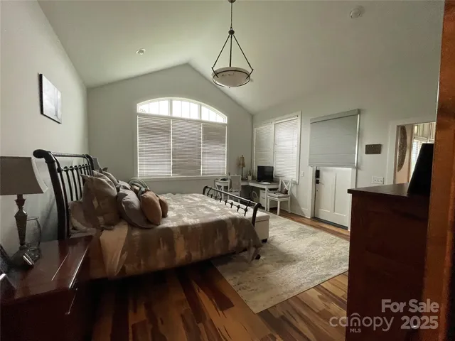 a kitchen with a refrigerator and a sink