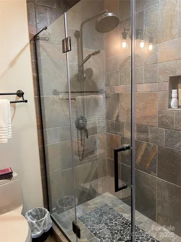 a kitchen with a sink cabinets and appliances