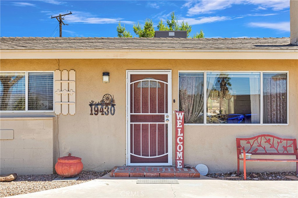 19430 Chippewa Road Apple Valley, CA 92307 - Photo 1 of 1 a view of a door and chair