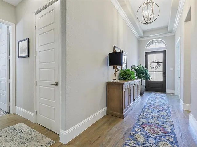 a view of entryway with wooden floor