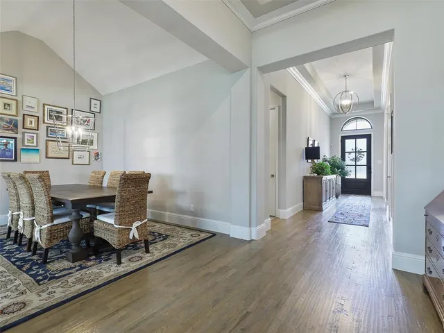 a work room with furniture and wooden floor