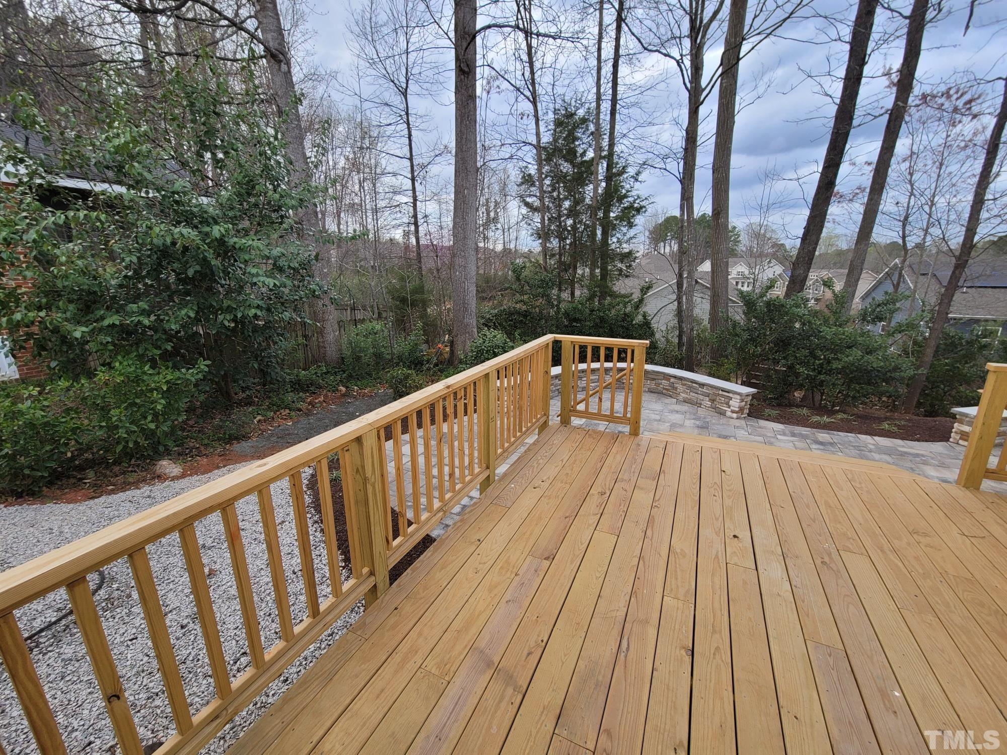 303 Evans Estates Drive Cary, NC 27513 - Photo 12 of 61 a view of balcony with wooden floor and fence
