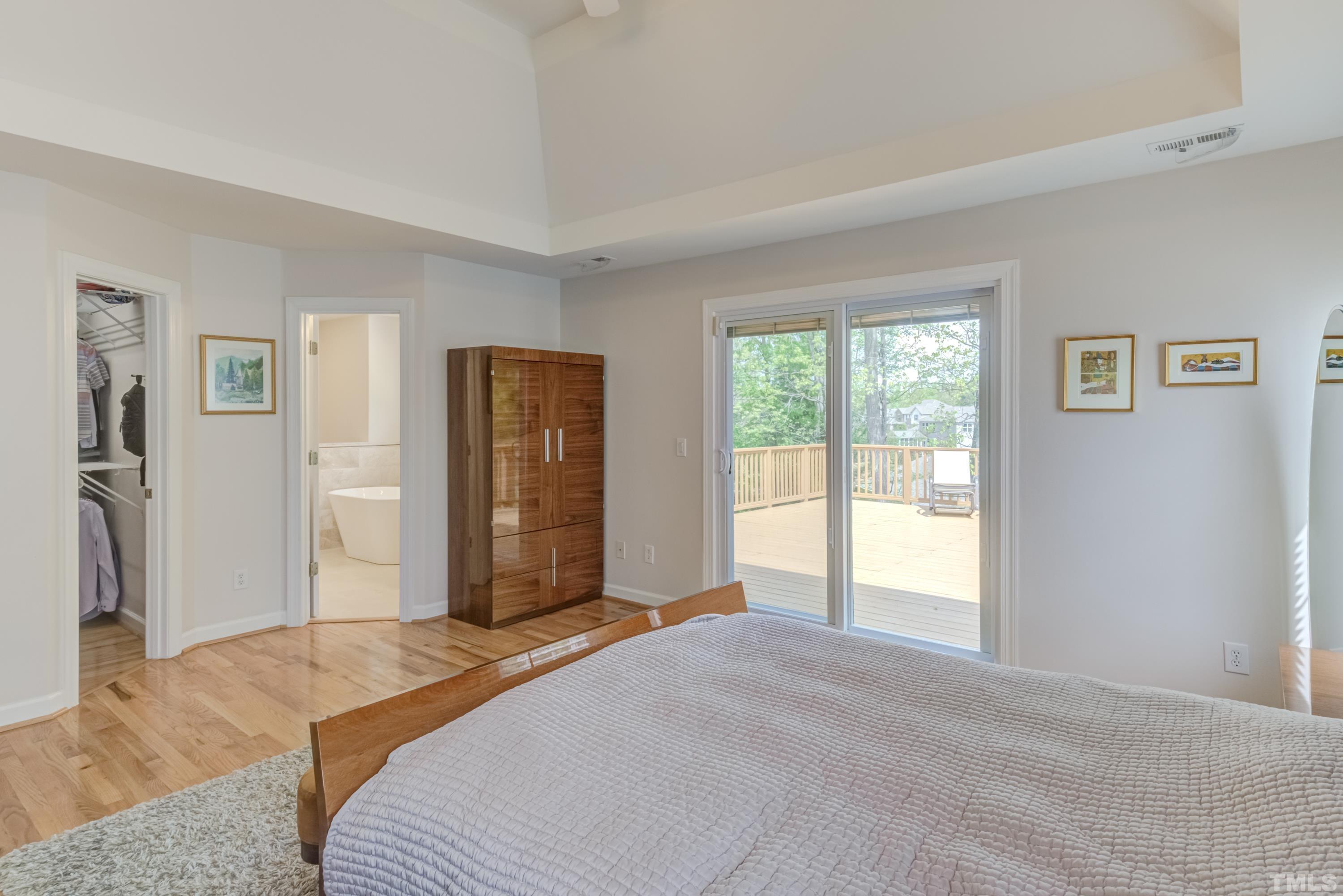 303 Evans Estates Drive Cary, NC 27513 - Photo 28 of 61 a bedroom with a bed and a window