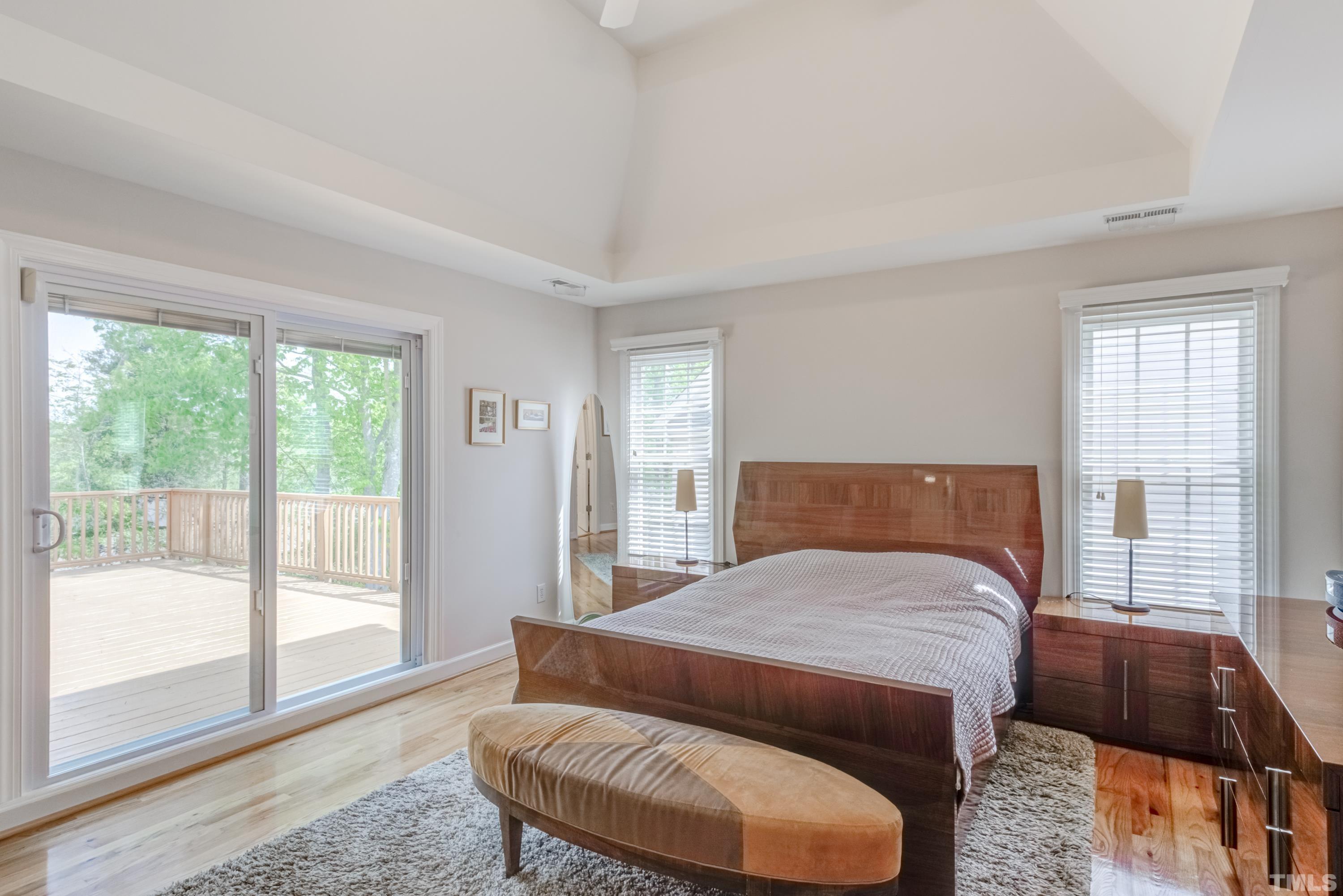 303 Evans Estates Drive Cary, NC 27513 - Photo 29 of 61 a bedroom with a bed and a large window