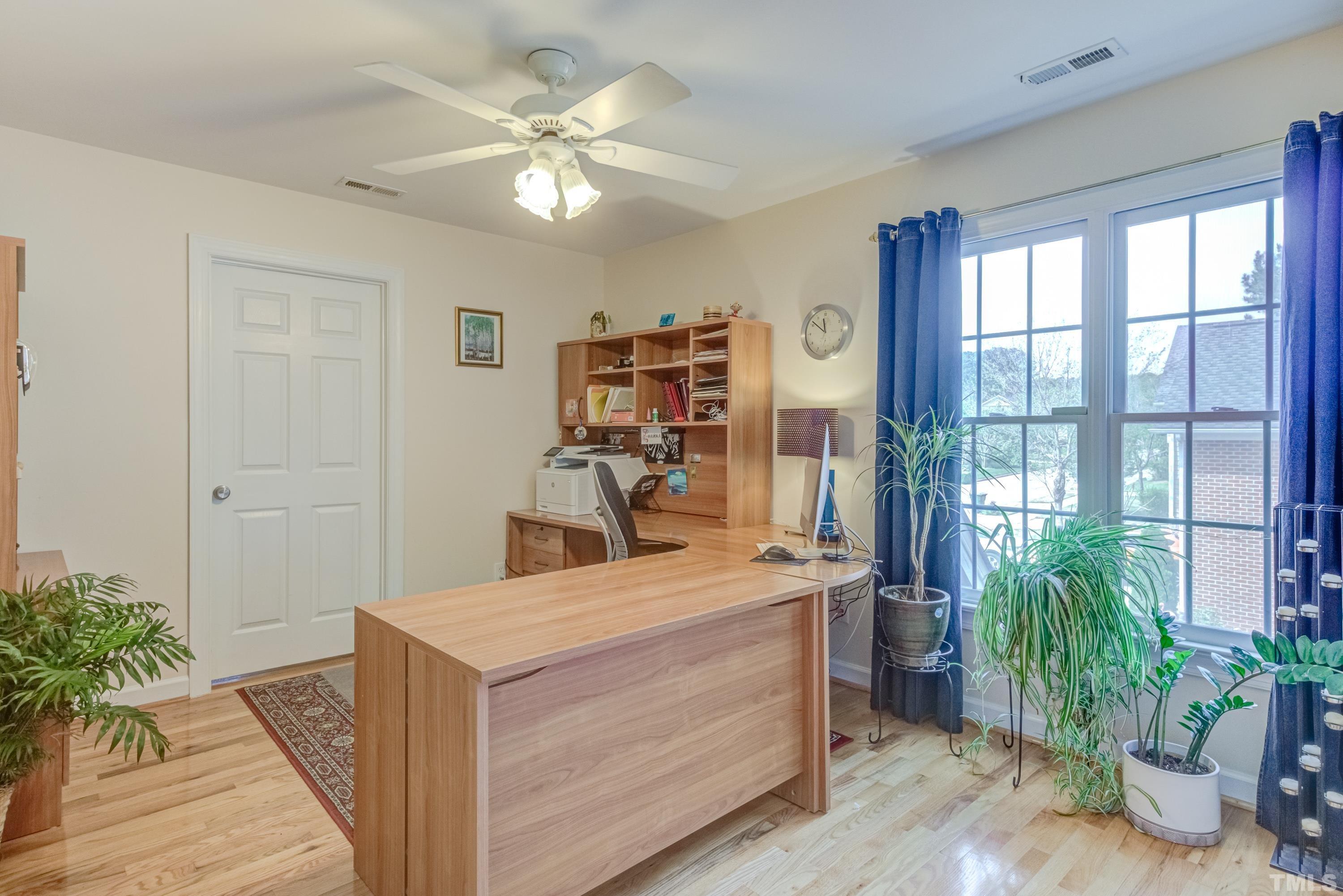 303 Evans Estates Drive Cary, NC 27513 - Photo 31 of 61 a view of living room and kitchen