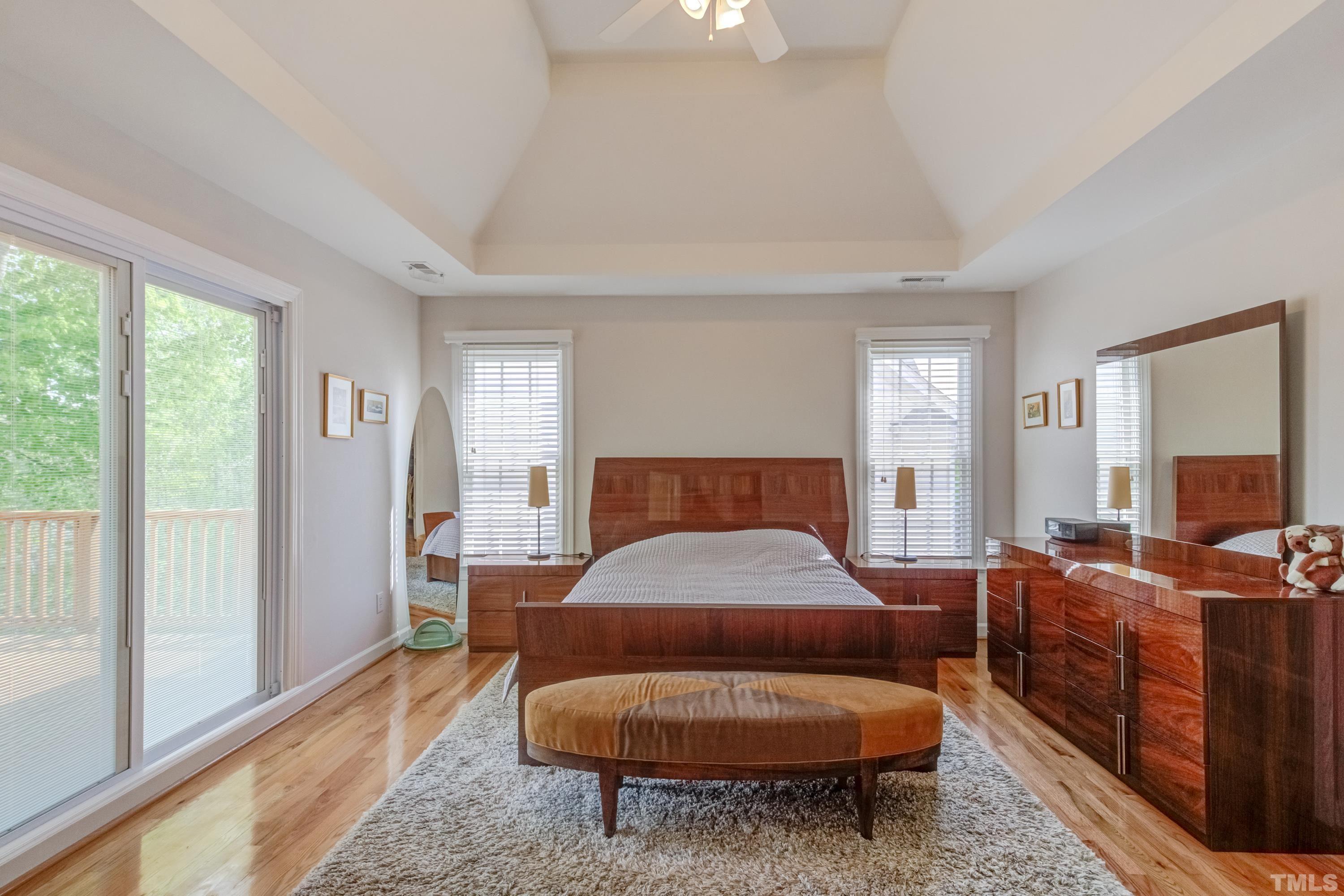 303 Evans Estates Drive Cary, NC 27513 - Photo 43 of 61 a bedroom with furniture and wooden floor