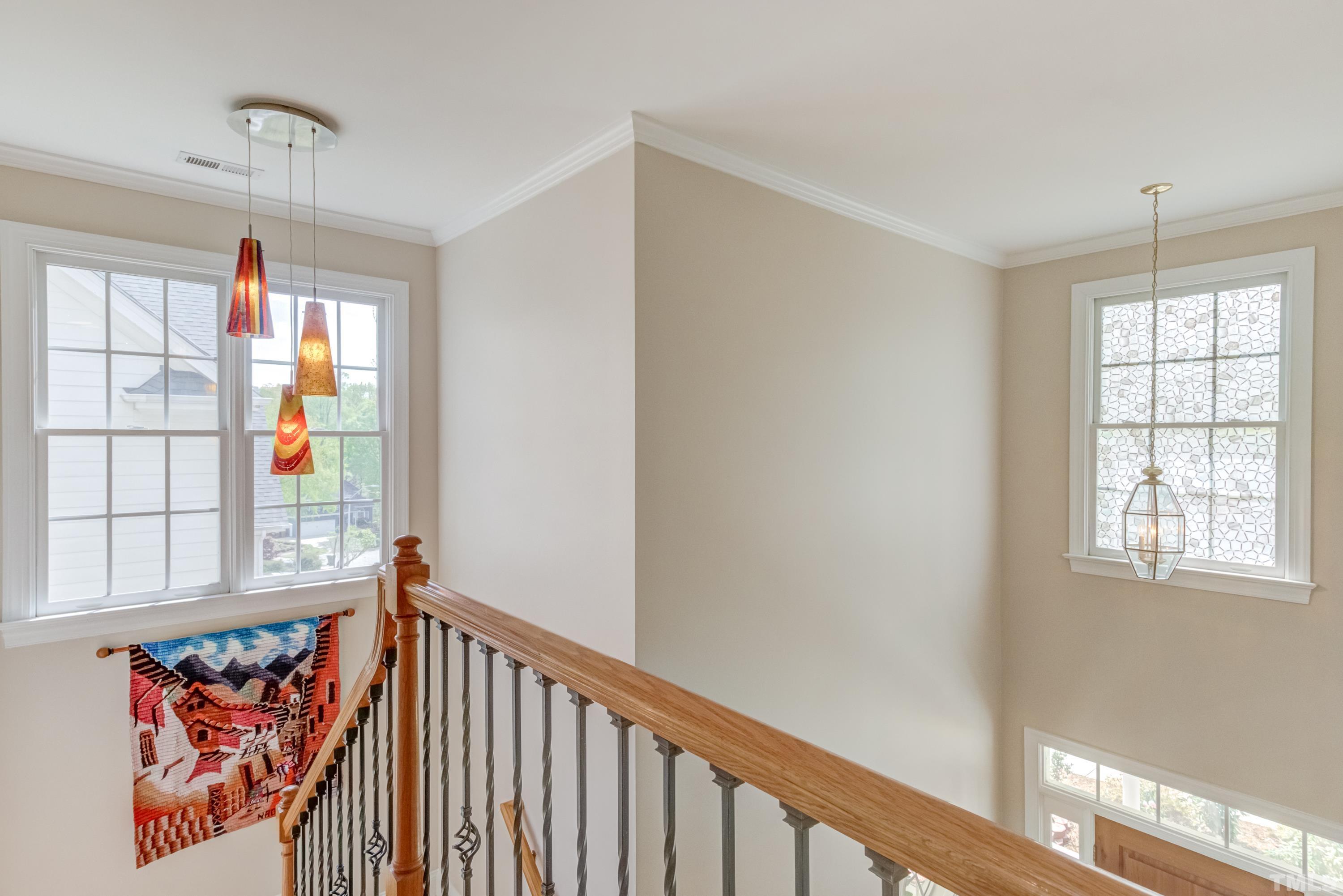 303 Evans Estates Drive Cary, NC 27513 - Photo 45 of 61 a view of hallway with windows
