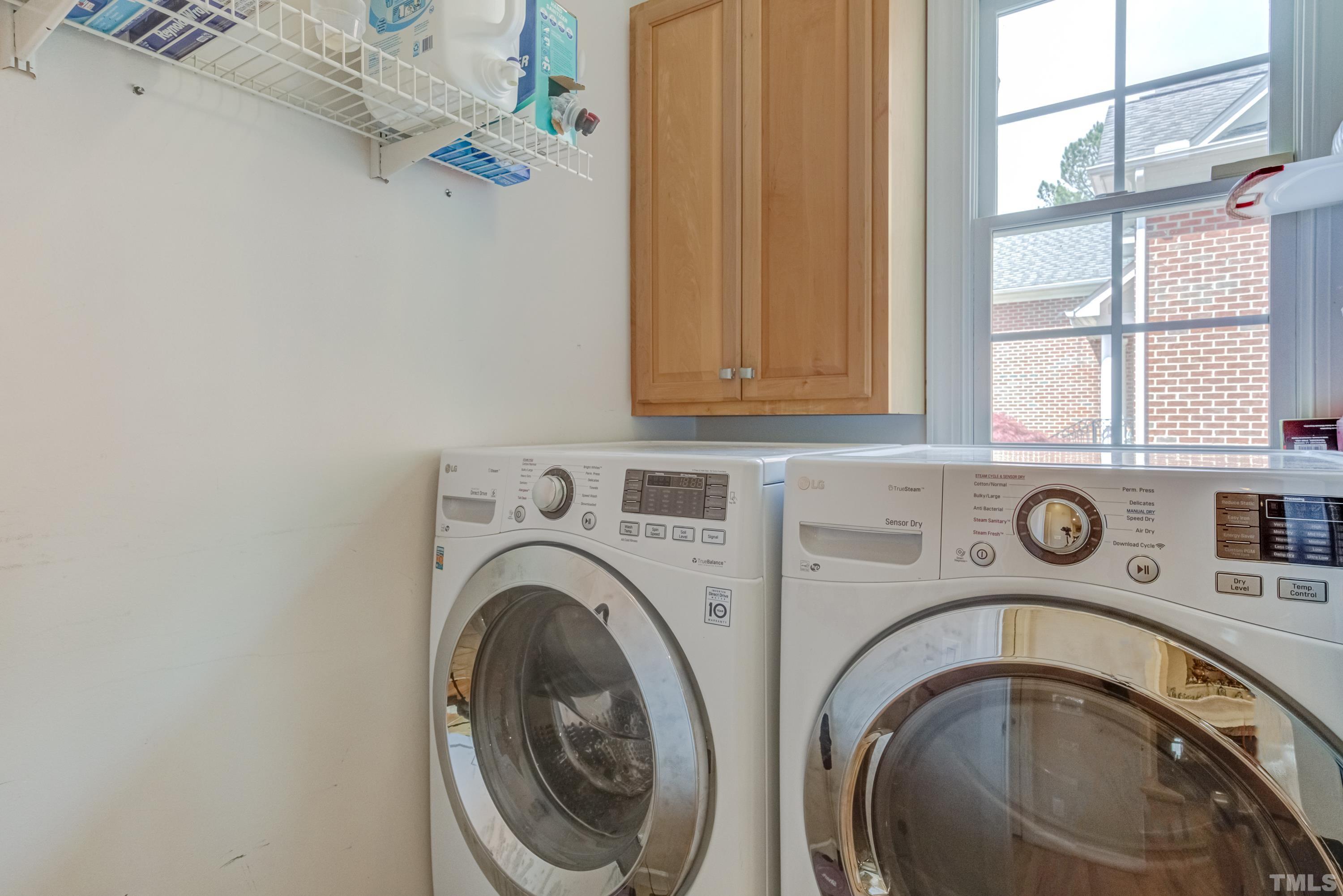 303 Evans Estates Drive Cary, NC 27513 - Photo 48 of 61 a utility room with dryer and washer