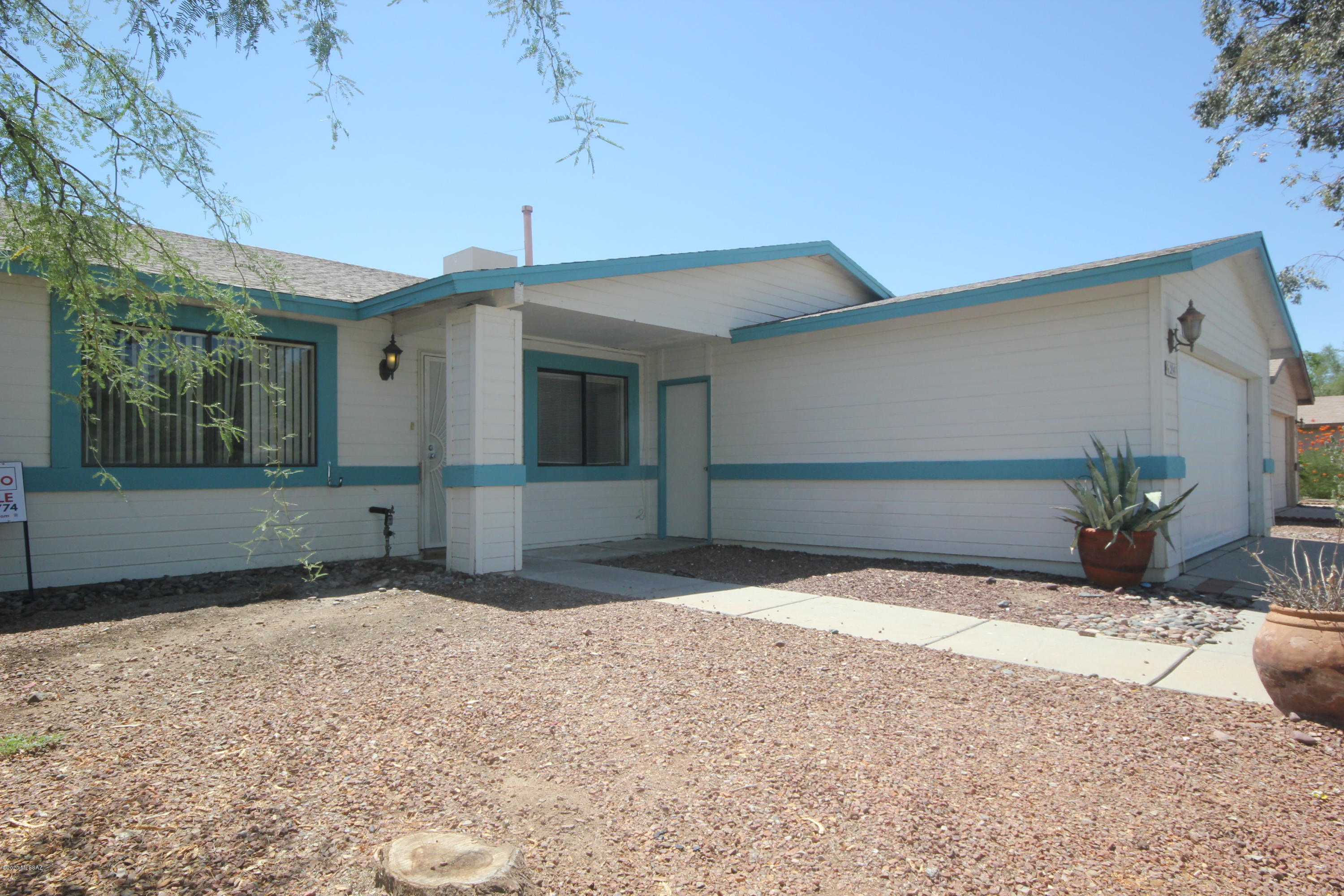 2841 West Firebrook Road Tucson, AZ 85741 - Photo 2 of 15 a front view of a house
