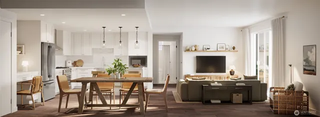 a view of a dining room with furniture and a flat screen tv