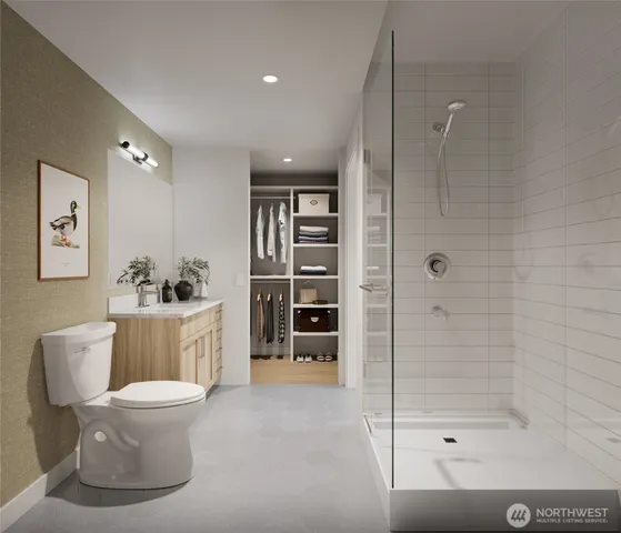 a living room with a toilet and a shower