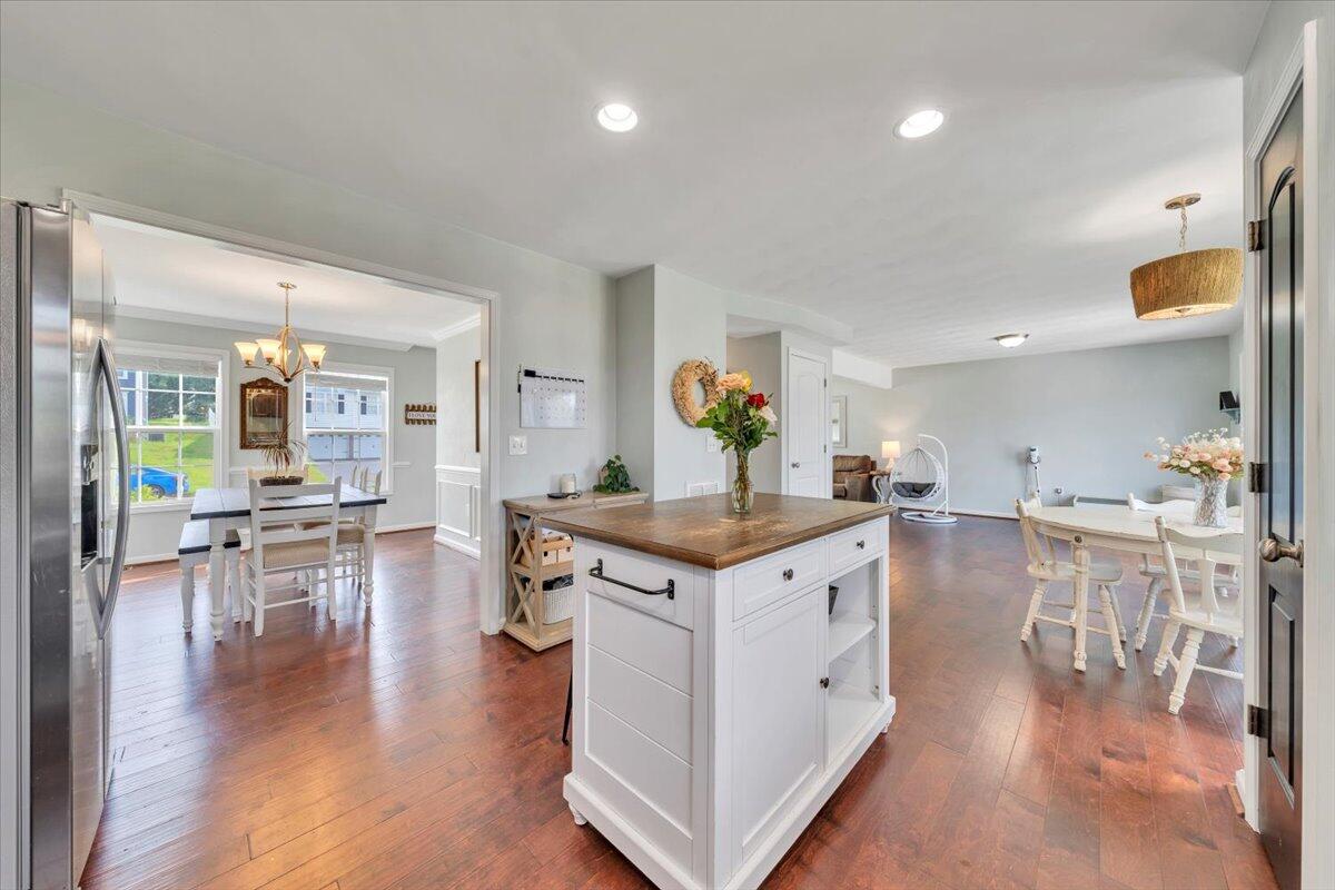 522 Cambridge Ct Road Vinton, VA 24179 - Photo 13 of 43 a kitchen with stainless steel appliances granite countertop a lot of counter space and wooden floor