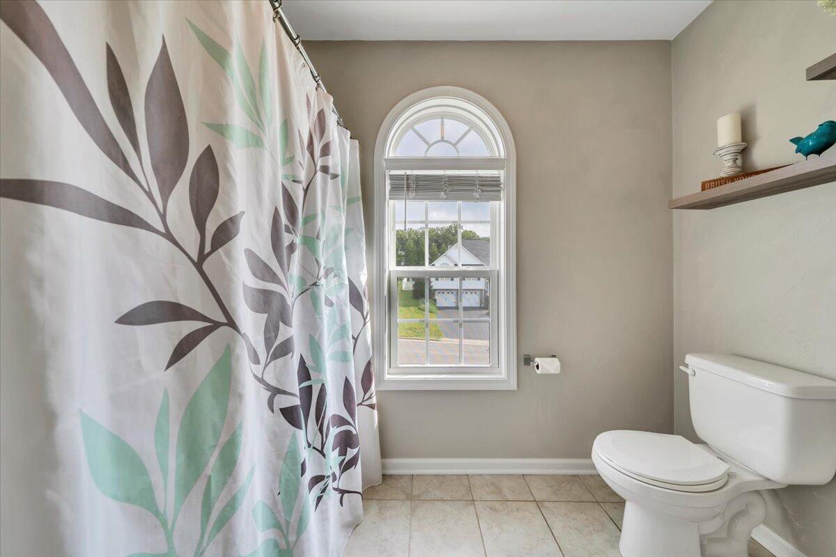 522 Cambridge Ct Road Vinton, VA 24179 - Photo 21 of 43 a view of a entryway with a flower pot and a window