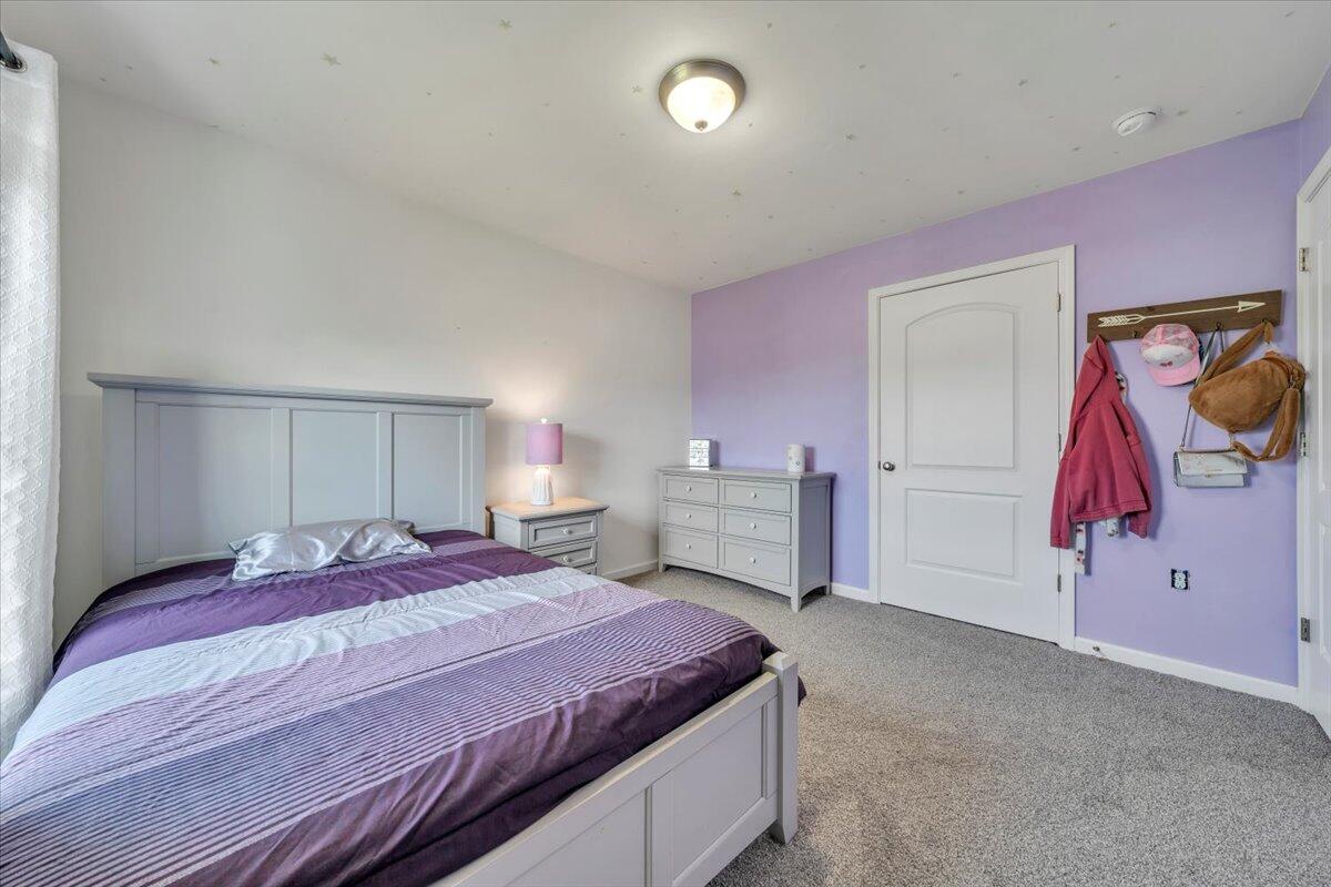 522 Cambridge Ct Road Vinton, VA 24179 - Photo 22 of 43 a bedroom with a bed and a window