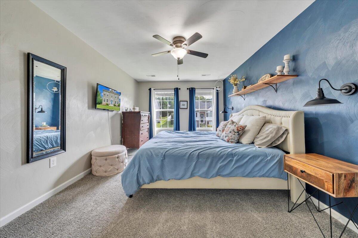 522 Cambridge Ct Road Vinton, VA 24179 - Photo 24 of 43 a bedroom with a bed and window