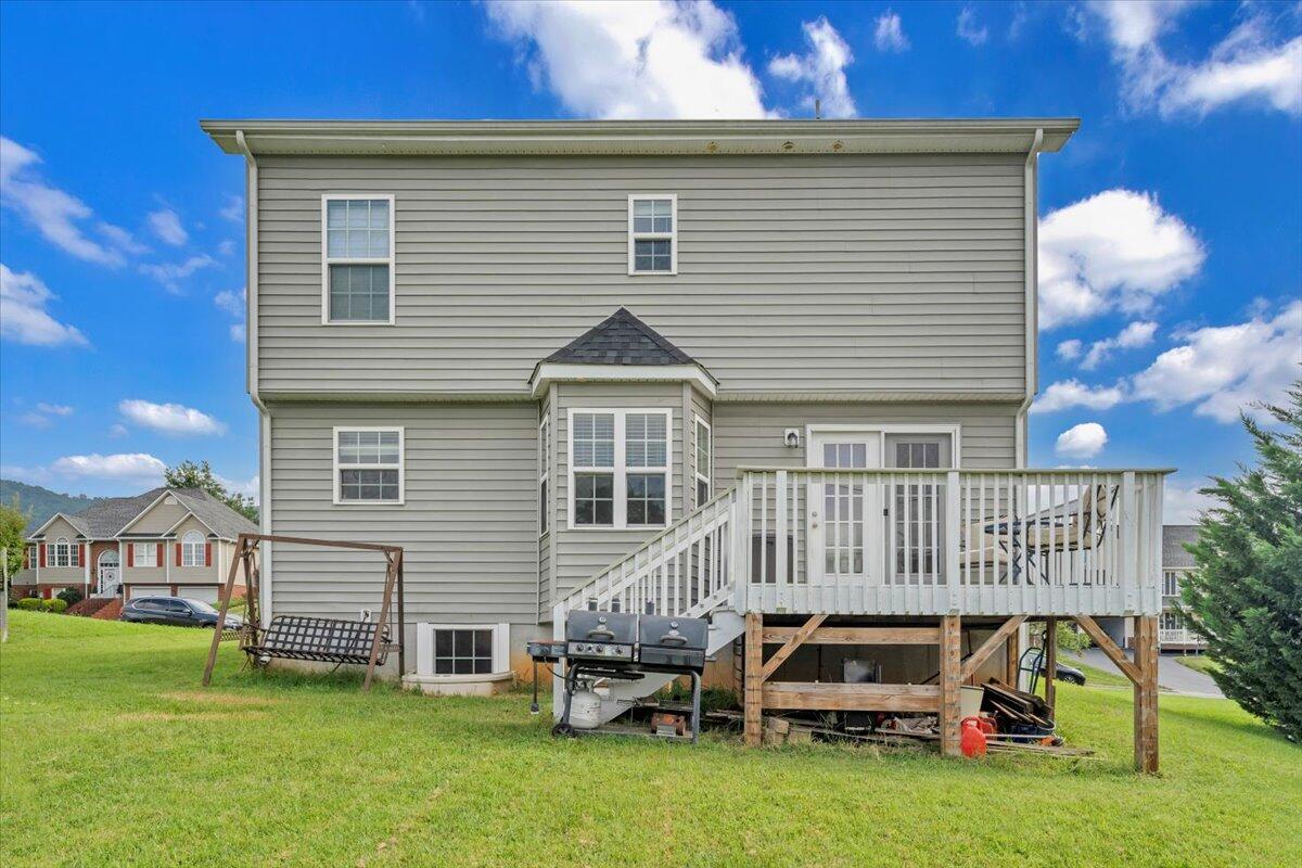 522 Cambridge Ct Road Vinton, VA 24179 - Photo 38 of 43 a front view of a house with a garden and plants