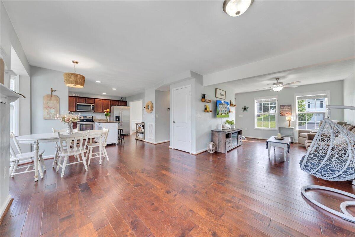 522 Cambridge Ct Road Vinton, VA 24179 - Photo 4 of 43 a view of dining room with furniture and wooden floor