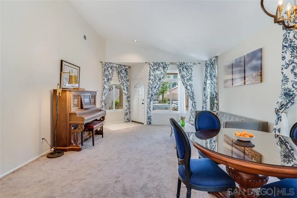 7570 Windy Ridge Road San Diego, CA 92126 - Photo 11 of 25 a living room with furniture and a window