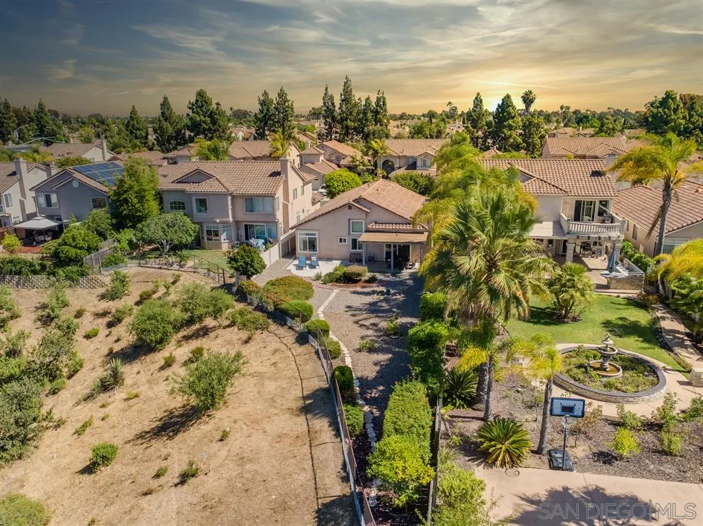 7570 Windy Ridge Road San Diego, CA 92126 - Photo 2 of 25 a view of a city with tall buildings