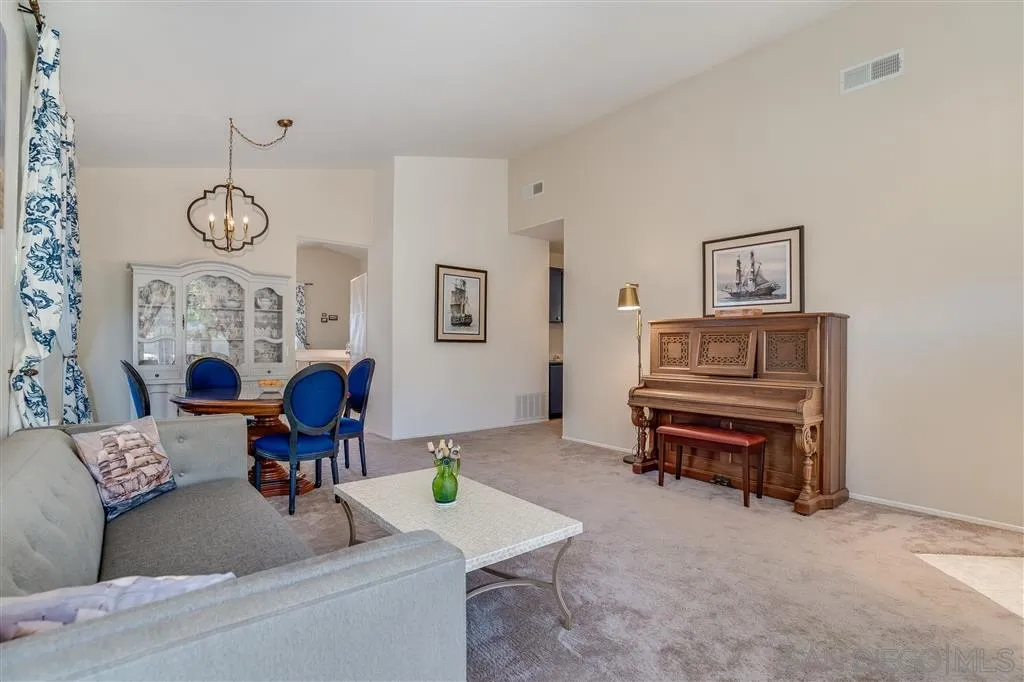 7570 Windy Ridge Road San Diego, CA 92126 - Photo 9 of 25 a living room with furniture and a window