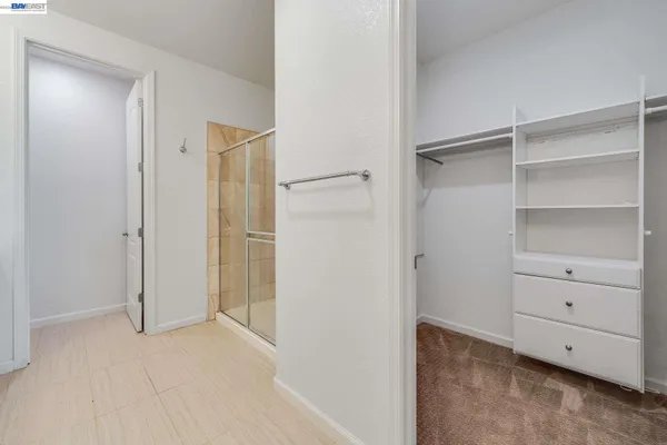 a view of an empty walk in closet