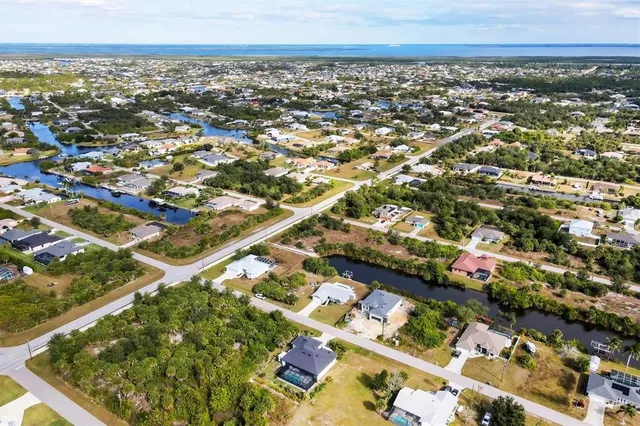 a view of a lake with a garden