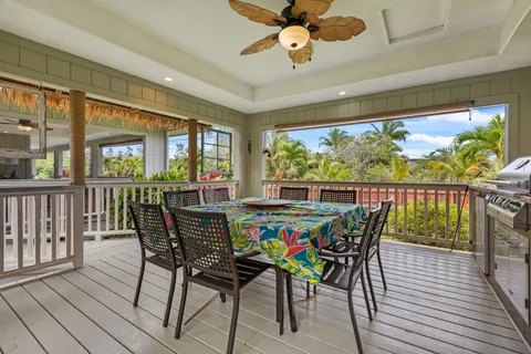 a view of balcony with wooden floor