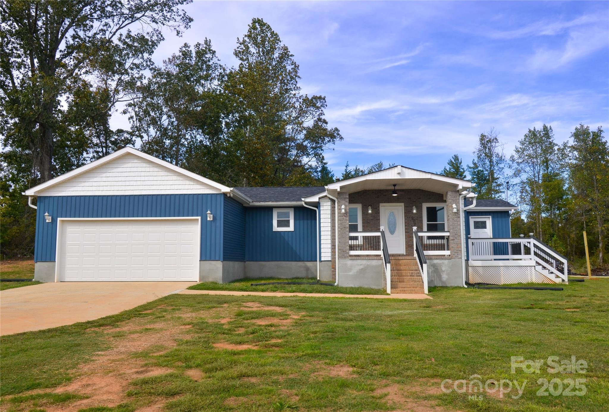 907 Carpenters Grove Church Road Lawndale, NC 28090 - Photo 1 of 33 a front view of a house with a yard