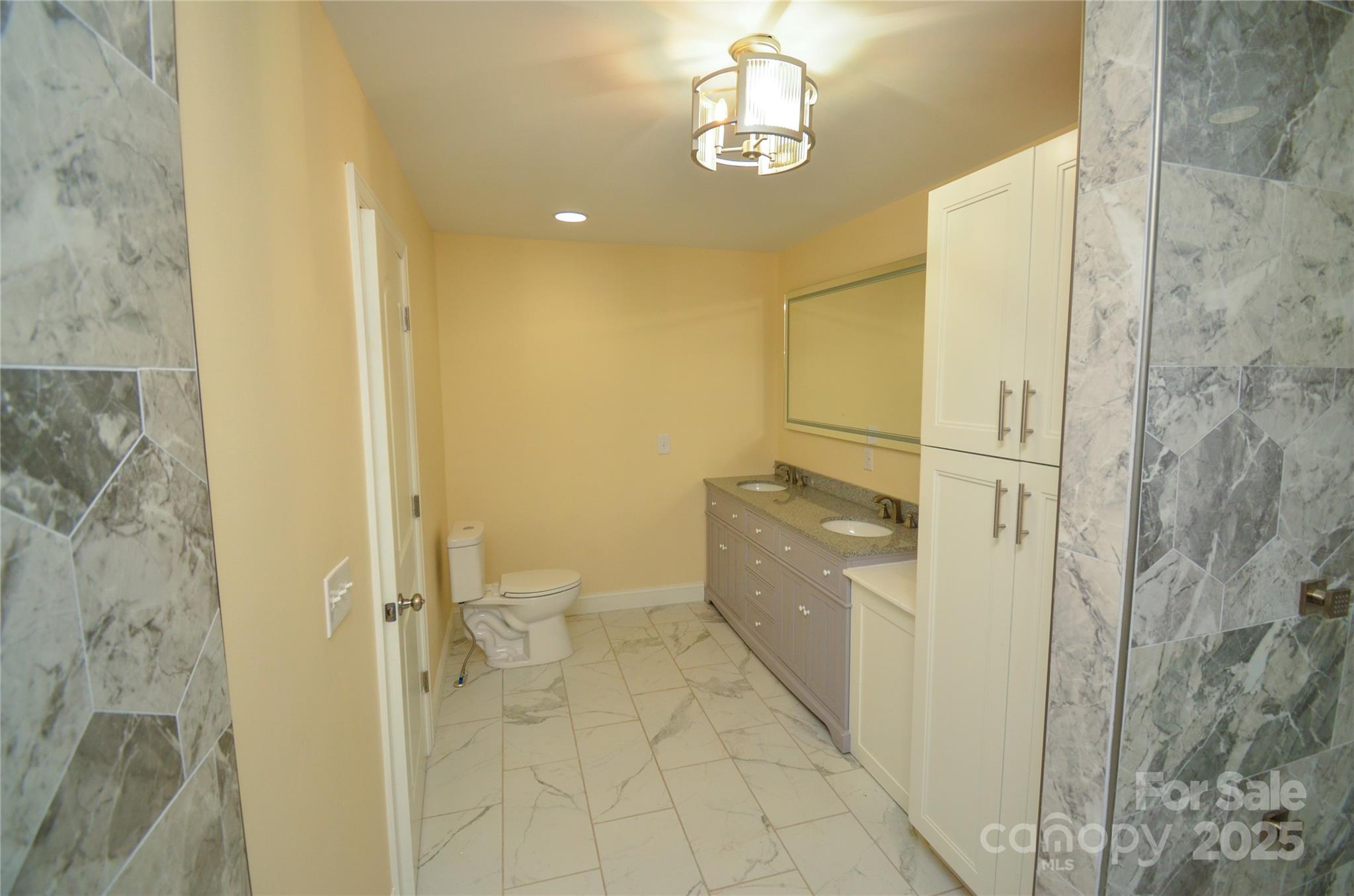 907 Carpenters Grove Church Road Lawndale, NC 28090 - Photo 19 of 33 a bathroom with a glass door shower