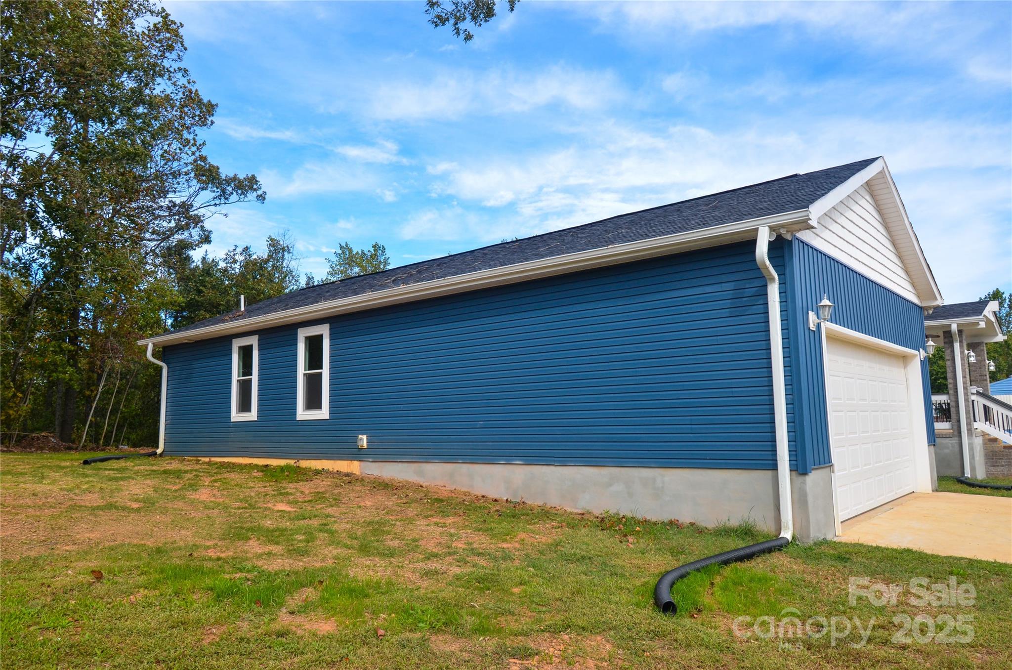 907 Carpenters Grove Church Road Lawndale, NC 28090 - Photo 2 of 33 a view of backyard of house