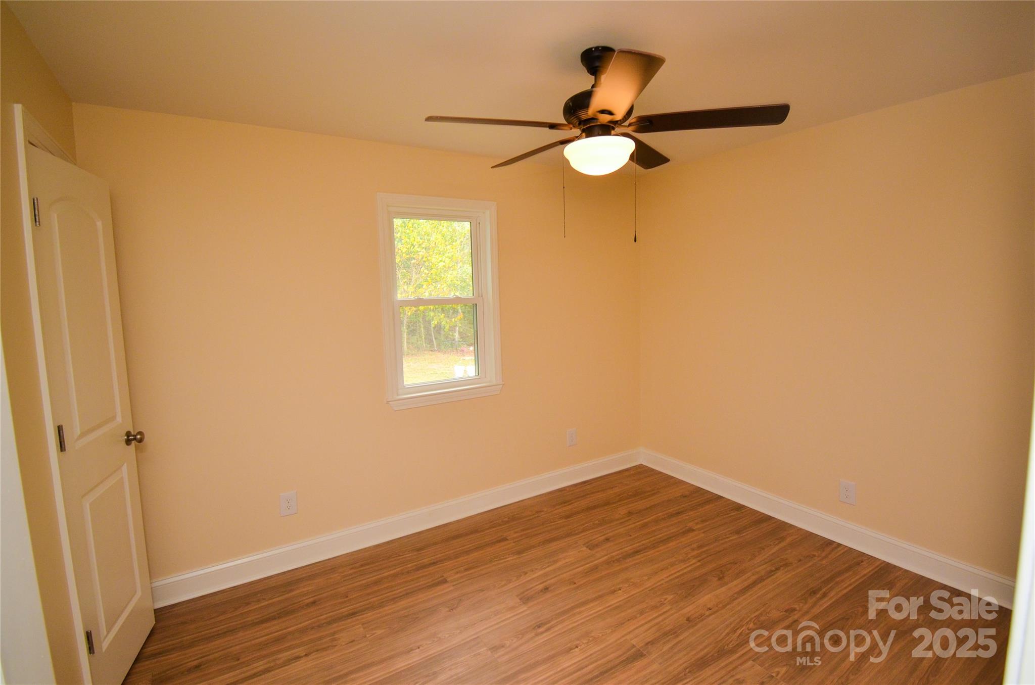907 Carpenters Grove Church Road Lawndale, NC 28090 - Photo 26 of 33 a view of empty room with wooden floor