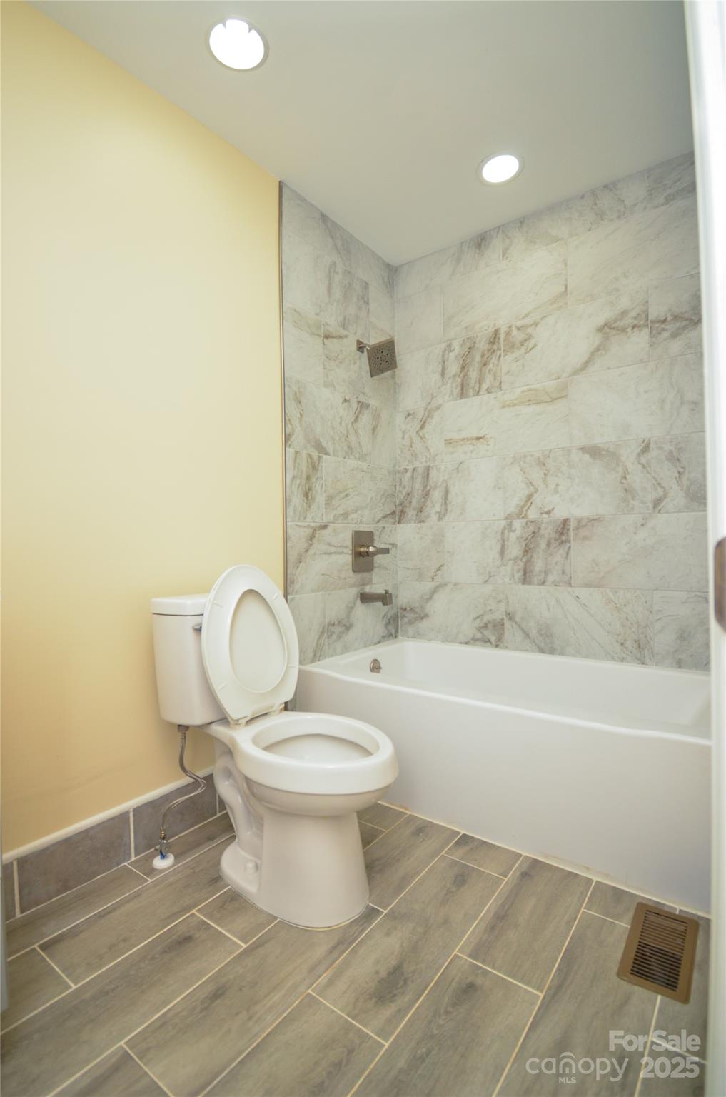 907 Carpenters Grove Church Road Lawndale, NC 28090 - Photo 31 of 33 a bathroom with a toilet a sink and bathtub