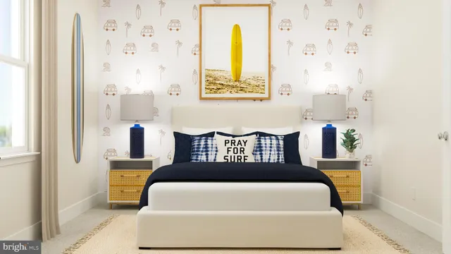 a large bedroom with a bed and a window