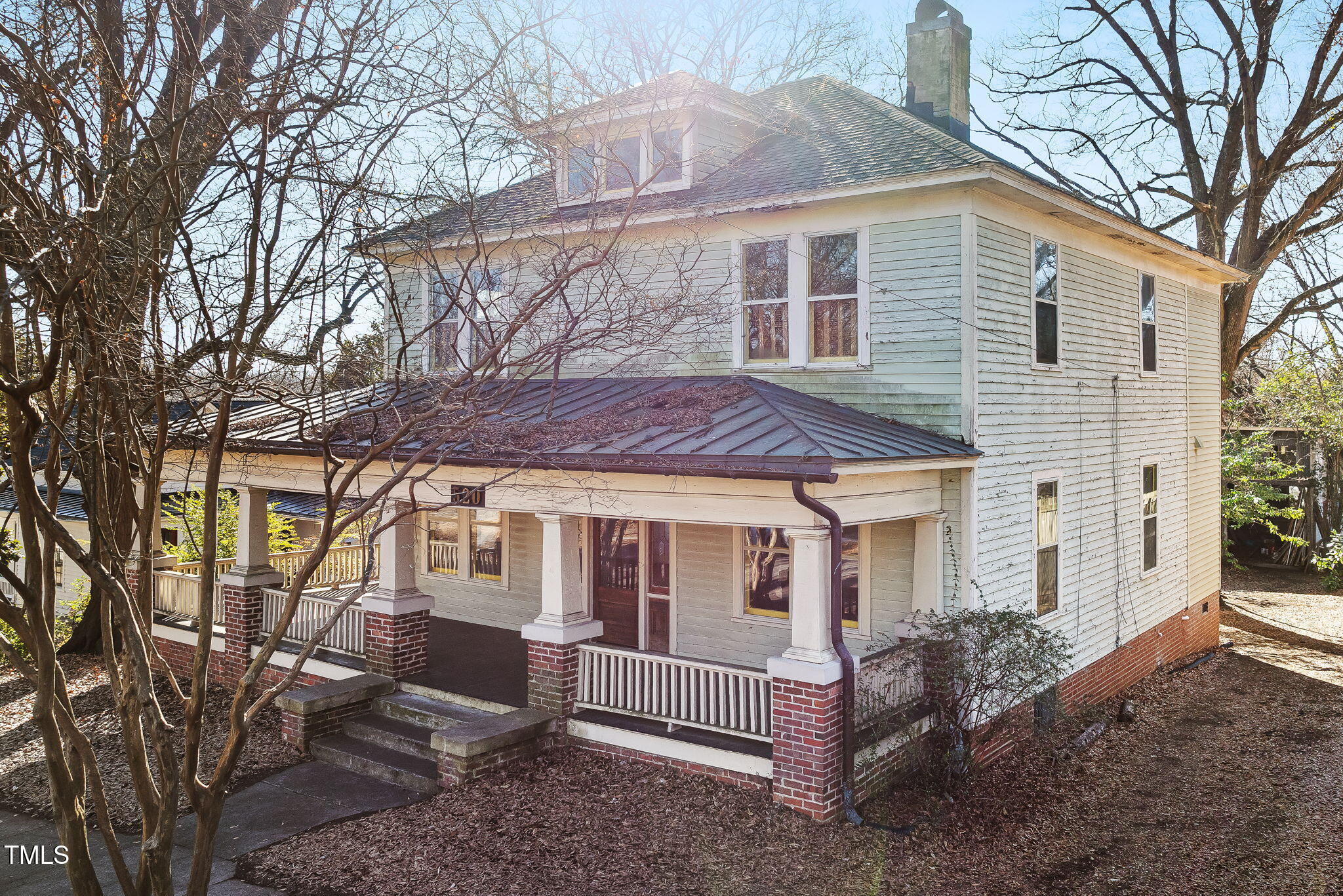 520 Polk Street Raleigh, NC 27604 - Photo 2 of 36 a view of a house with a yard